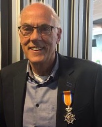 André de Reus geridderd